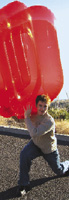Casey Fenton with his inflatable sofa