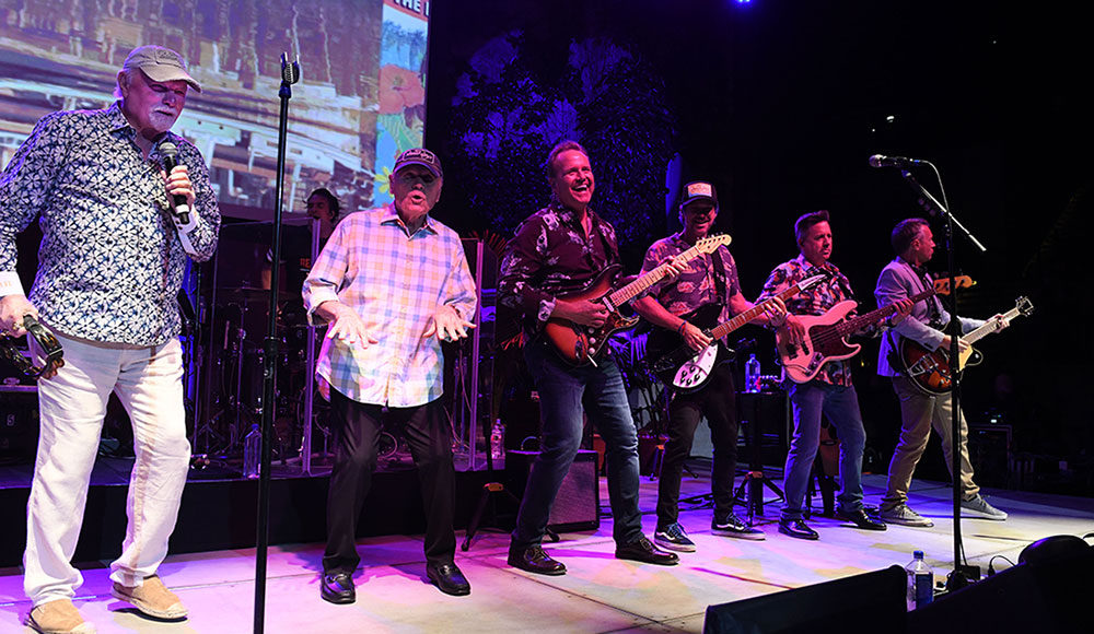 Musicians lined up on a stage