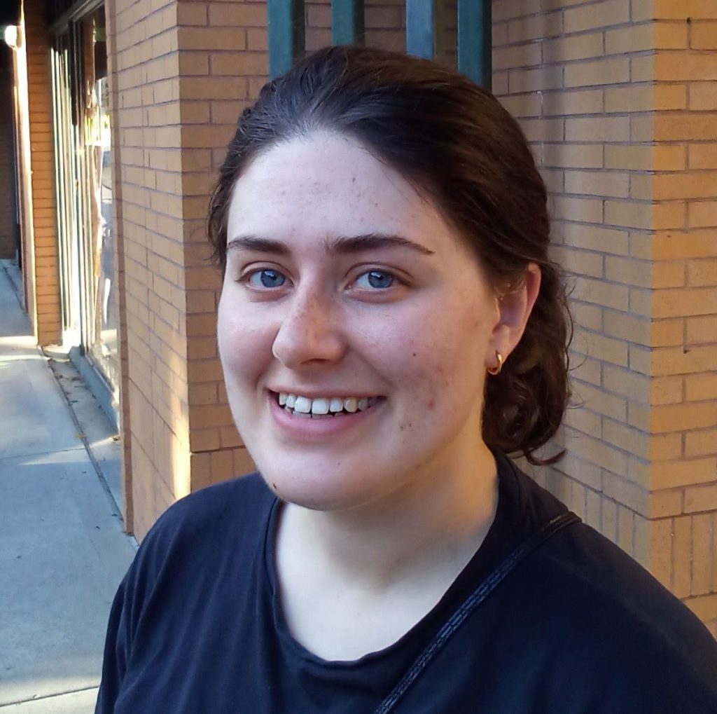 28 year old Cora Edwards brunette in black t-shirt