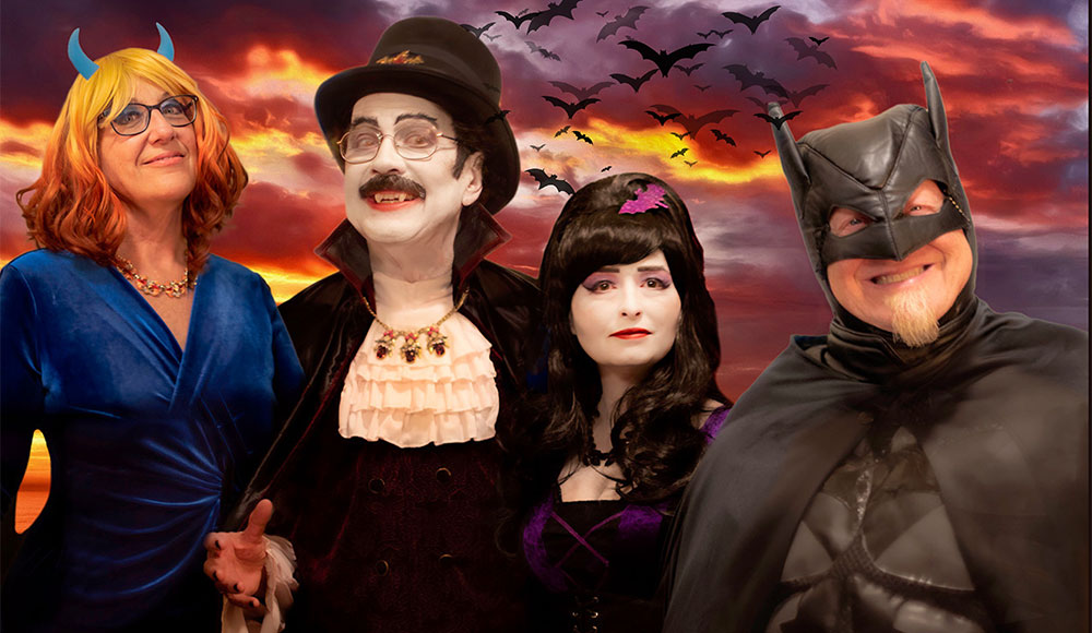 Bonny June and Bonfire in Halloween costumes.