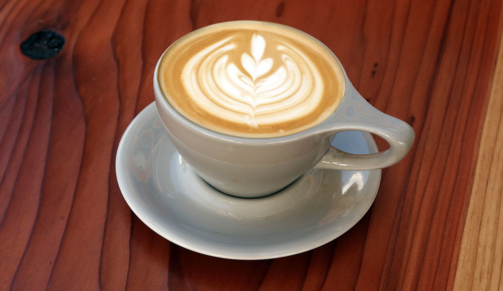 Latte with decorative foam on top