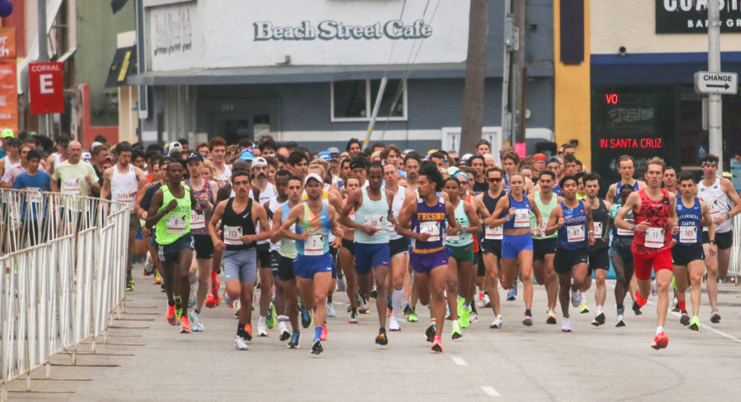 Runners getting ready to start a raice on a city street