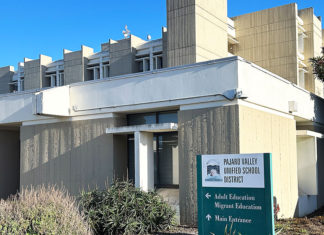 Public Weighs In on 150 Proposed Layoffs in PVUSD Exterior of the Pajaro Valley Unified School District headquarters building in Watsonville, California, on a clear day.