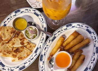 Thai Score Shared plates at Coconut Thai featuring roti with dipping sauces and crispy coconut shrimp.