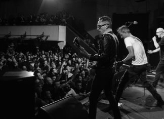 ‘Punk Spirit’ Author John Malkin on Mindfulness in the Mosh Pit Black-and-white photo of musicians performing onstage